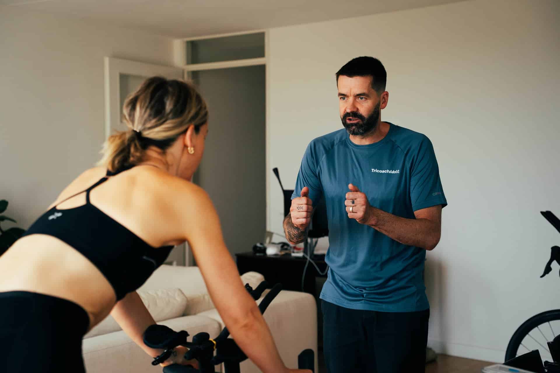 Matt coaching a triathlete on bike positioning