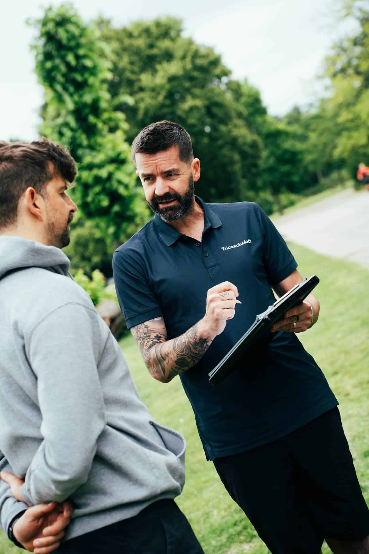 Matt coaching a triathlete before a run session